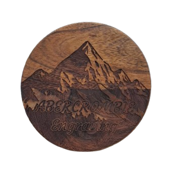 Wooden coaster with mountain engraving and 'Abercrombie Engraving' branding
